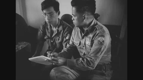 Officers write down information and give speech about healthcare program - Stock Footage 106403465