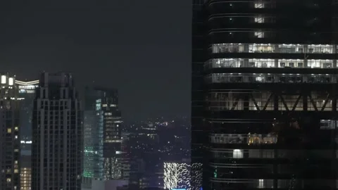 Offices tower building window at night in jakarta business district 4K Stock Footage 193400389