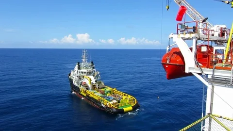 Offloading activity at offshore oil and gas platform rig. Stock Footage 81822444
