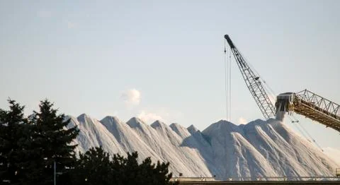 Offloading Mountains Of Road Salt Dockside Stock Photos