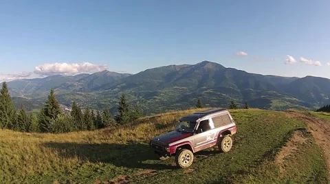 Offroad car on top of the mountain Stock Footage 41338671