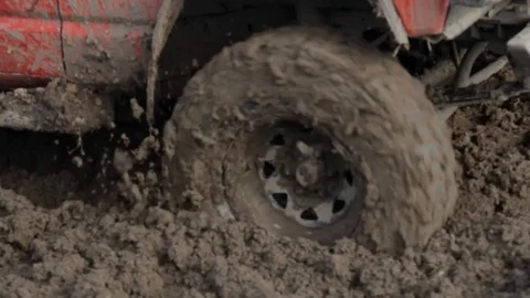 Offroad car is trying to cross the muddy area Stock Footage 71303240