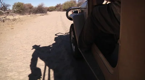 Offroad driving in sandy riverbed Stock Footage 62508085