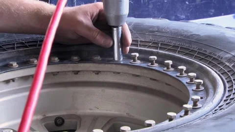Offroad Tire Being Installed on a Beadlock Wheel Vidéo 264071094