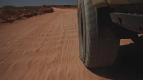 Offroad vehicle, outback running shot close up tyre shot. Stock Footage 321449447