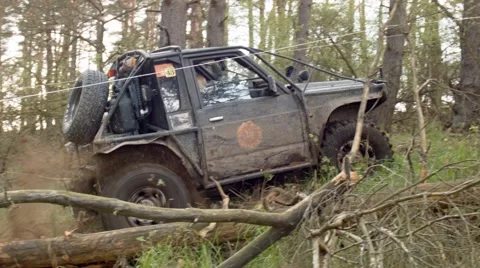 Offroad vehicle on the slope can't progress Stock Footage 58280511