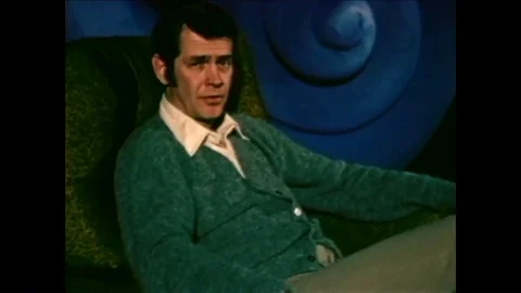 An offscreen interviewer explains the dangers of high level noise to an off duty Stock Footage 92630269