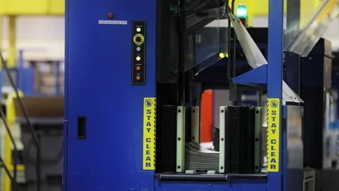 Offset printing with the paper going through the press Stock Footage 195614795