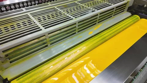 Offset printing press. Lithographic press with yellow ink dispenser. Stock Footage 310544806