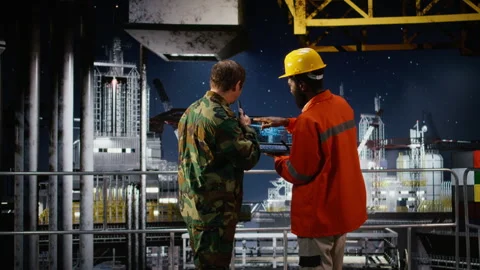 Offshore engineer and naval officer using AI technology on laptop Stock Footage 324706892