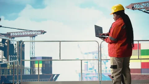 Offshore engineer using laptop to analyze subsea mapping data Stock Footage 319974911