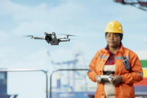 Offshore installation worker doing UAV drone surveillance Stock Photos