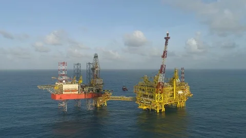 Offshore jack-up drilling rig and gas production platform Stock Footage 102459144