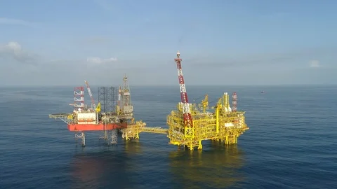 Offshore jack-up drilling rig and gas production platform Stock Footage 102459200