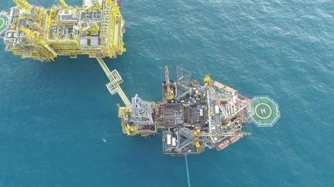 Offshore jack-up drilling rig and gas production platform Stock Footage 102459293