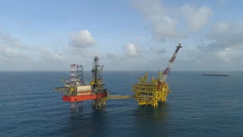Offshore jack-up drilling rig and gas production platform Stock Footage 102459821
