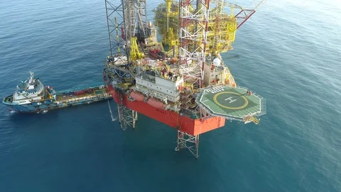 Offshore jack-up drilling rig and gas production platform Stock Footage 102460896