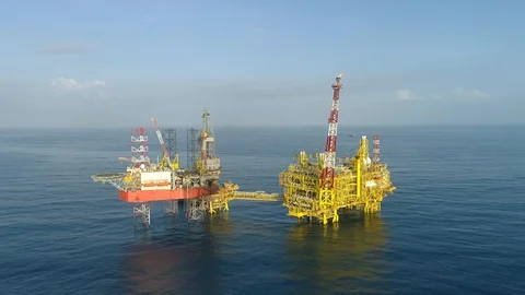 Offshore jack-up drilling rig and gas production platform Stock Footage 102480421