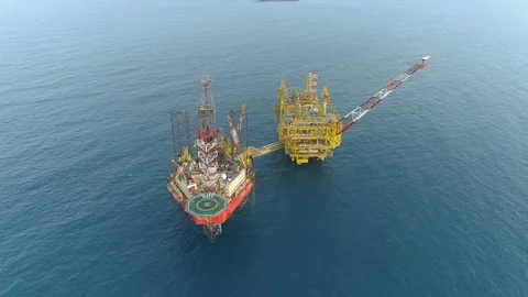 Offshore jack-up drilling rig and gas production platform Stock Footage 102480623