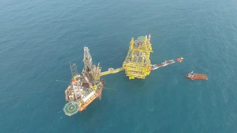 Offshore jack-up drilling rig and gas production platform Stock Footage 102480937