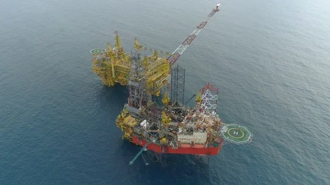 Offshore jack-up drilling rig and gas production platform Stock Footage 102480980
