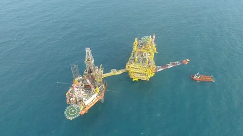 Offshore jack-up drilling rig and gas production platform Stock Footage 102481045
