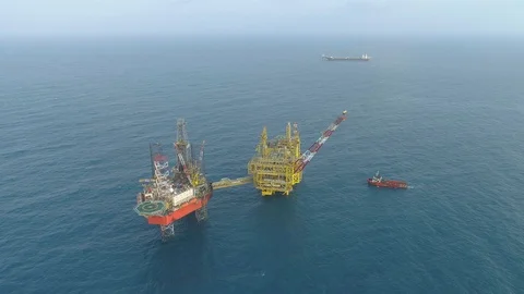Offshore jack-up drilling rig and gas production platform Stock Footage 102481260