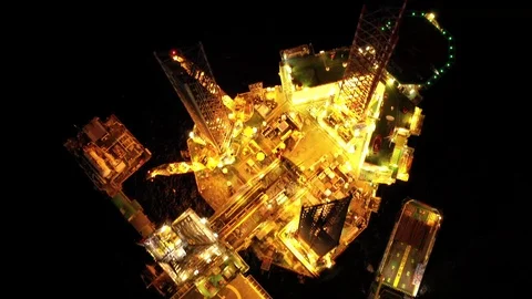 Offshore jack-up drilling rig at night Stock Footage 119621774