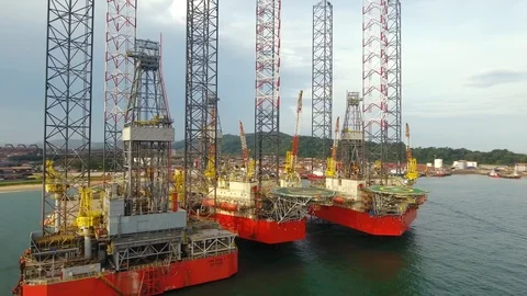 Offshore jack-up drilling rigs at a shipyard Stock Footage 102460313