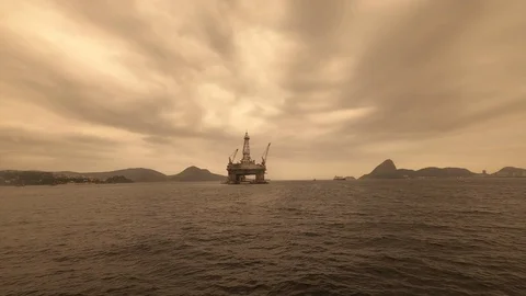 Offshore oil platform and the Sugar Loaf seen from the barge. Guanabara Bay Stock Footage