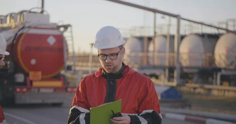 Offshore oil rig workers discuss working issues shaking hands. oil and gas Video stock 108983371