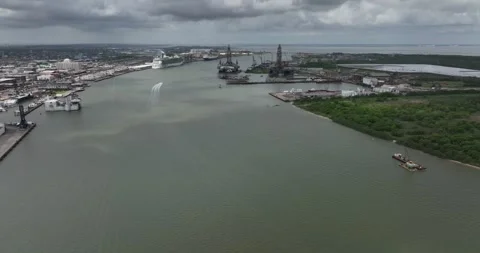 Offshore oil rigs nearing construction completion before being towed out to sea Stock Footage 335670831