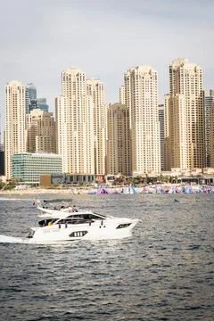 Offshore passing in front of the bay seen from Ain Eye Square in Dubai - Un.. Stock Photos