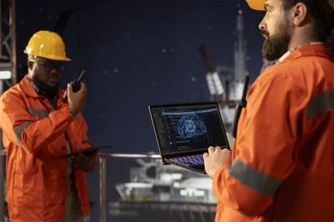 Offshore platform crew experts using neural network AI models Stock Photos