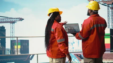 Offshore platform employees use management software to observe operations Stock Footage 319974518