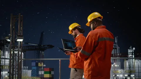 Offshore platform expert uses AI monitoring drilling operation during oil crisis Stock Footage 336197816