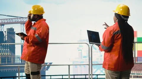 Offshore platform worker using AI LLM to analyze subsea mapping data Stock Photos