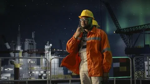 Offshore rig radio operators coordinate safe supply routes during oil crisis Stock Photos