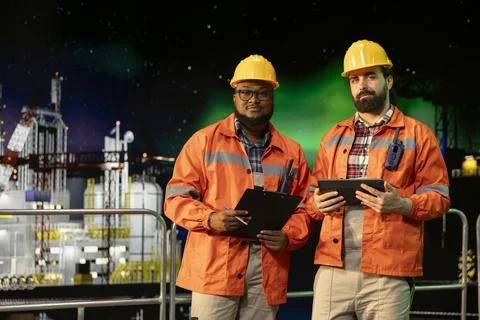 Offshore sea platform engineering team working together Stock Photos