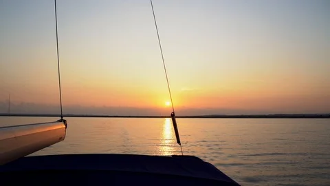 Offshore sunset view over Ladies Mile beach in Limassol from sailing yacht Stock Footage 120233811