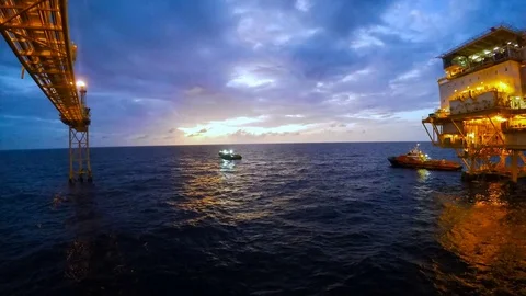 Offshore timelapse with flare and crew boat pick up passenger Stock Footage 80483484