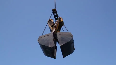 Offshore transfer of coal from barges to cargo ships Stock Footage 147657003