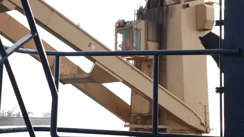 Offshore transfer of coal from barges to cargo ships Stock Footage 147657690