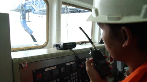 Offshore transfer of coal from barges to cargo ships Stock Footage 147658633