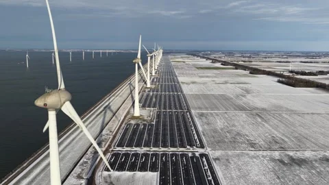 Offshore Wind and Solar Energy Park in Winter Aerial View Stock Footage 326465080