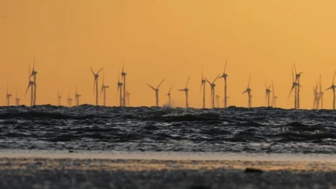 Offshore wind farm during sunset in Baltic sea. Stock Footage 107498062