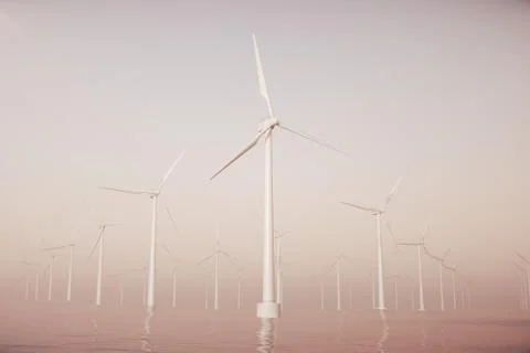Offshore wind farm turbines caught in sunset sky. Beautiful contrast with the Stock Illustration