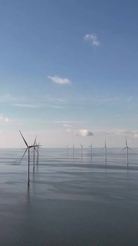 Offshore wind farm turbines generating renewable energy Stock Footage 327114076