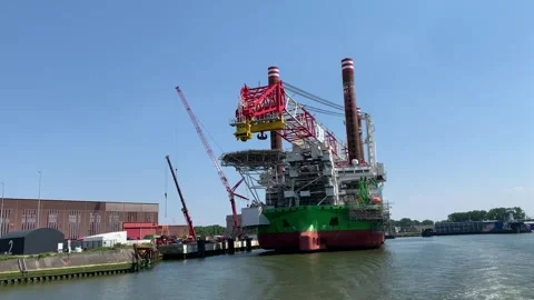 Offshore wind farms construction vessel. Renewable energy industry. Rotterdam Stock Footage 254190152