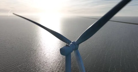 Offshore wind park, close up view of a large wind turbine on open water Vídeo Stock 304026157